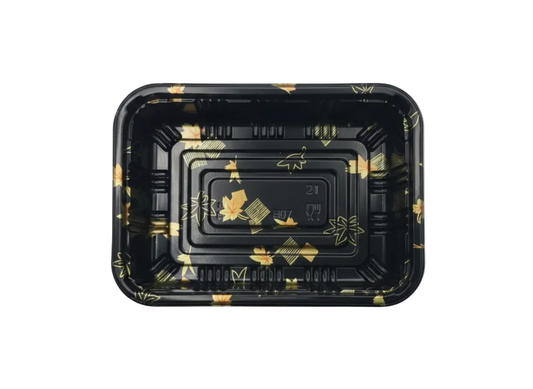 Black plastic tray with gold decorative patterns on a white background