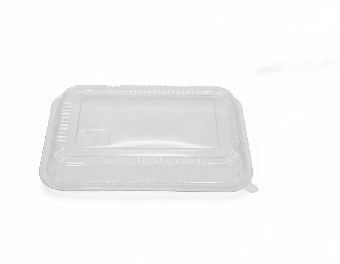 Clear plastic food container lid on a white background