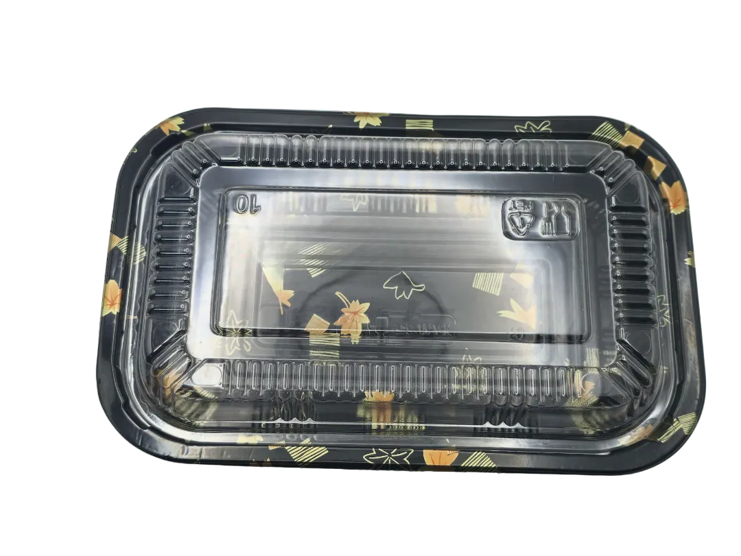 Black plastic food container with clear lid on a white background