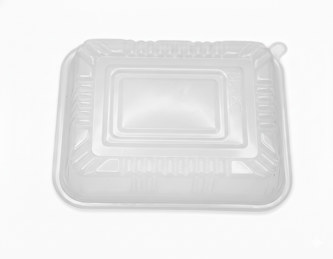 Clear plastic food container lid on a white background