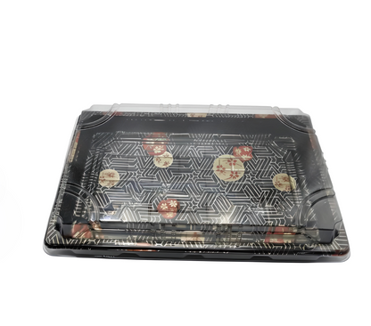 sushi box with a geometric design on the base with a clear lid, placed on a white background