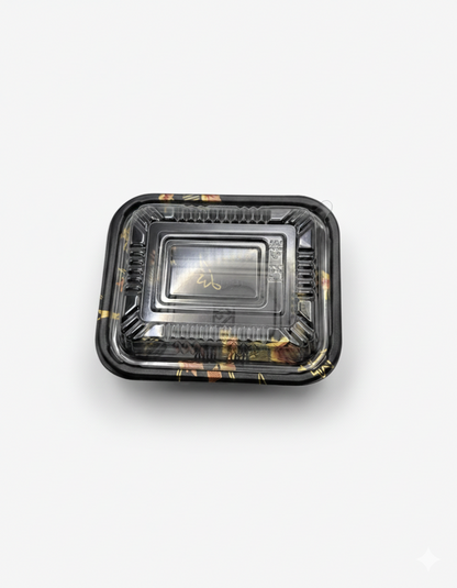 Black rectangular food container with clear lid on a white background