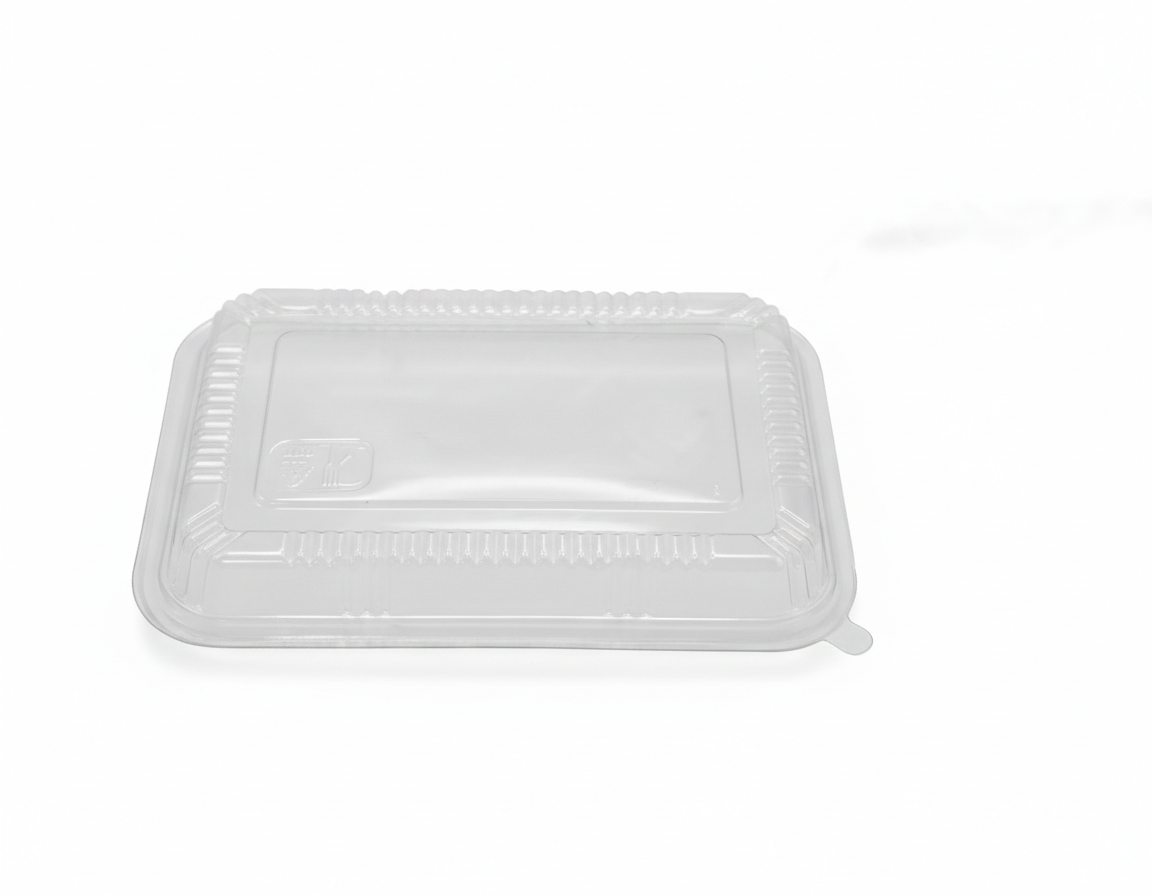 Clear plastic food container lid on a white background