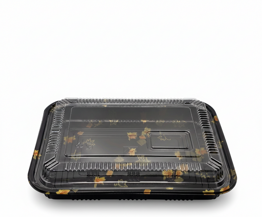 Black plastic food container with clear lid on a white background