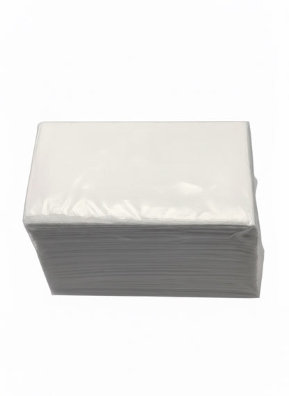 Stack of white paper towels on a white background