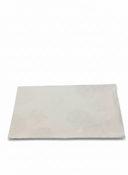 Rectangular white bath mat on a white background