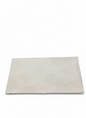 Rectangular white bath mat on a white background