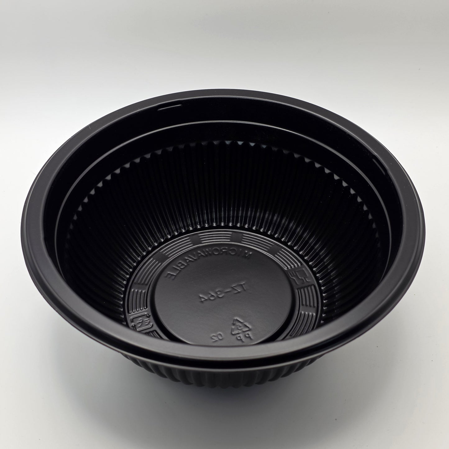 Black plastic container on a white background