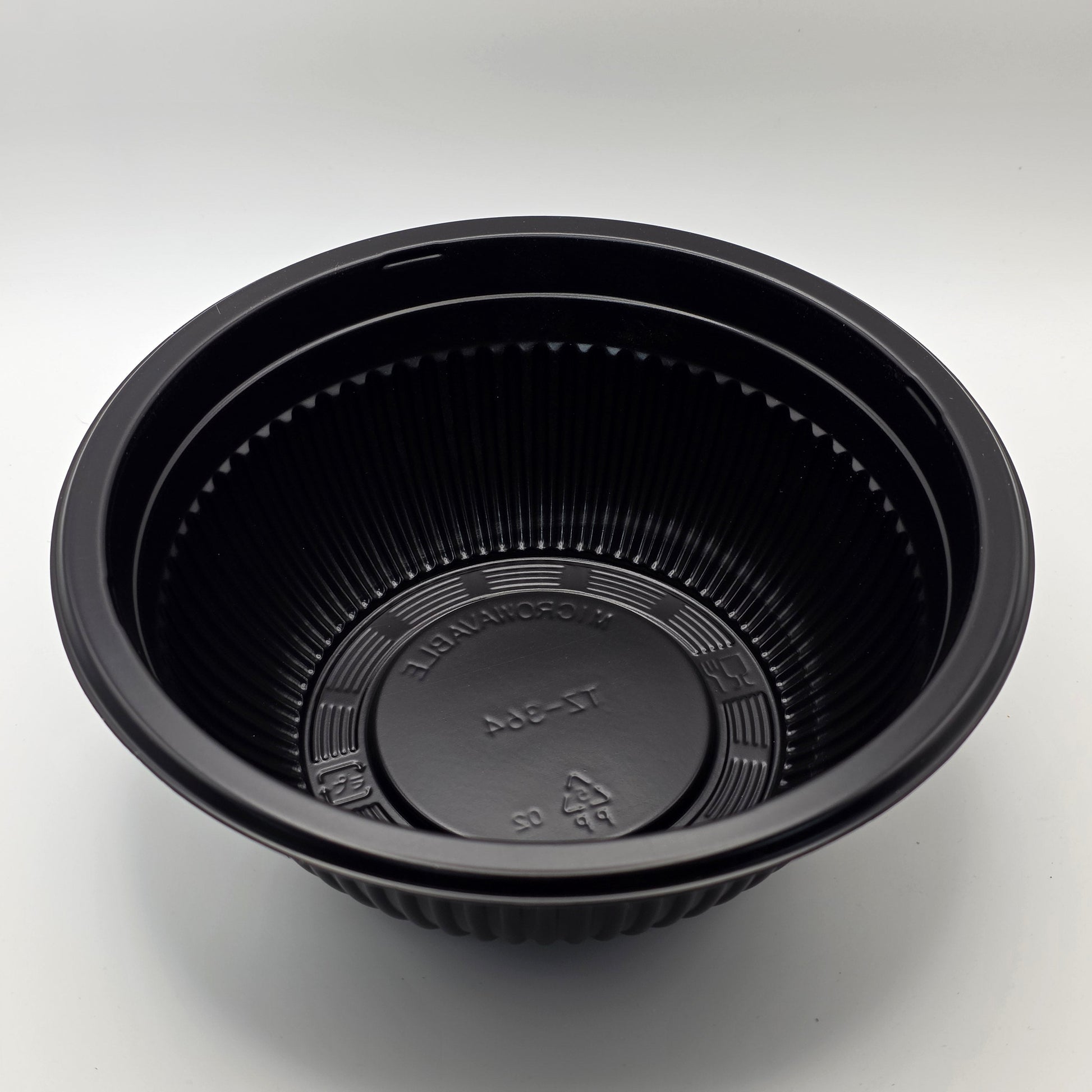 Black plastic container on a white background