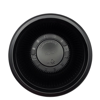 Black plastic container with a lid on a white background