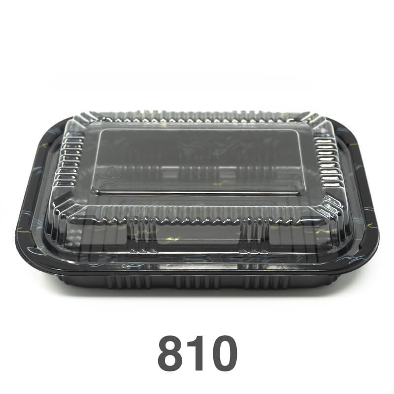 A rectangular black plastic lunch box with its lid on, labeled with the number 810.